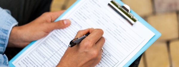 Closeup of a Person Filling a Track Record